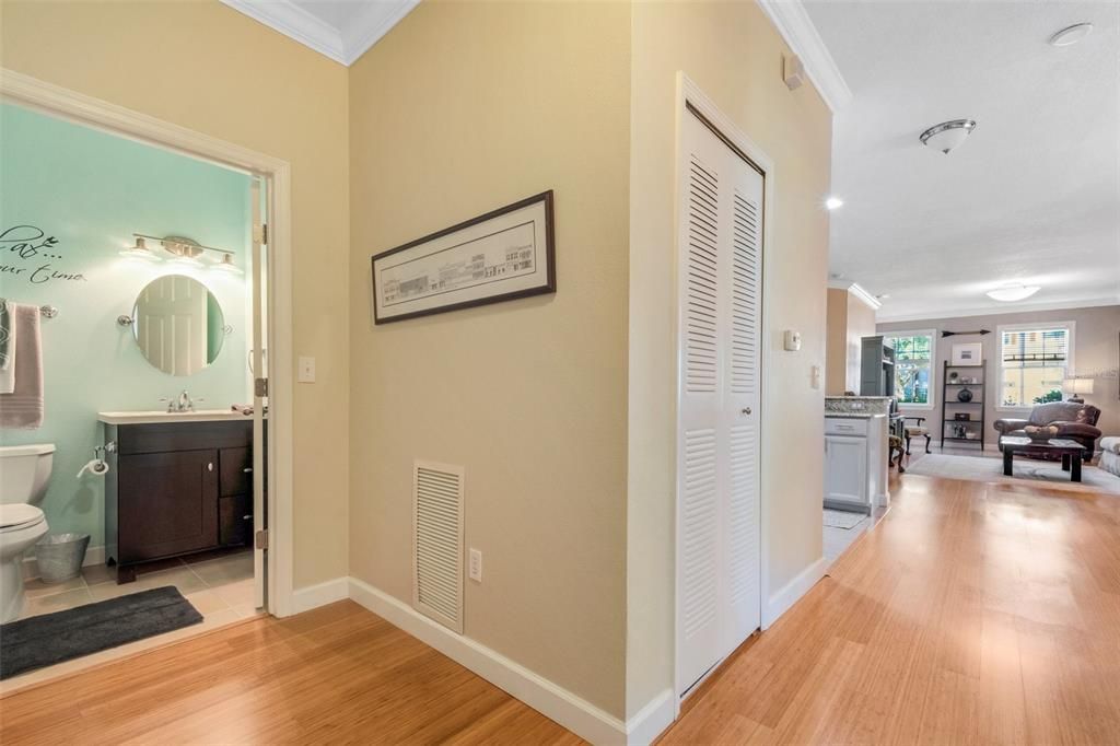 Hallway to laudry room, 2nd bedroom and a full bath