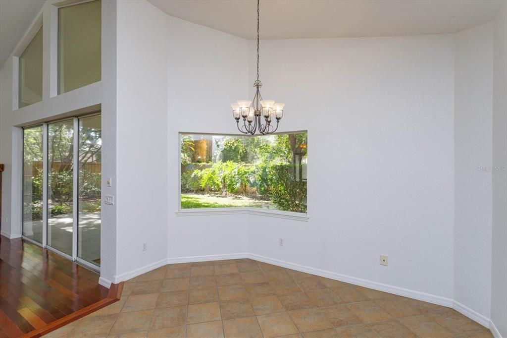 Large dinette area that has a lovely picture window with a view of the yard.