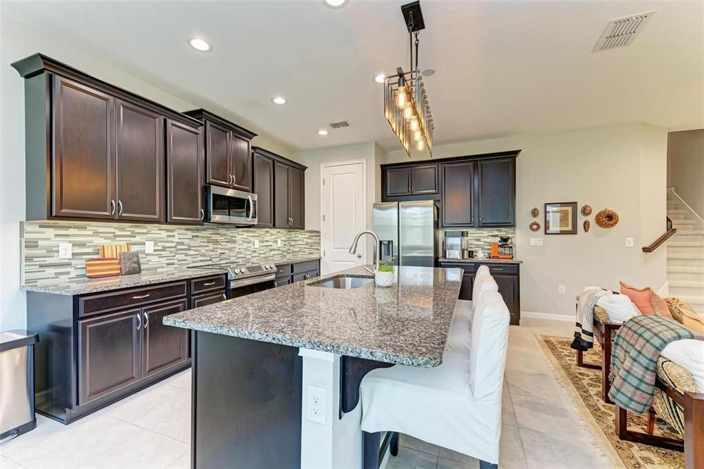 Open kitchen with great storage space including closet pantry.