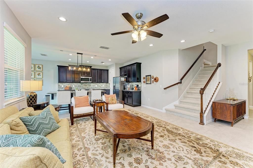 Kitchen/great room combo is great for entertaining.  Stairwell leads to 4 bedrooms & 2 baths.