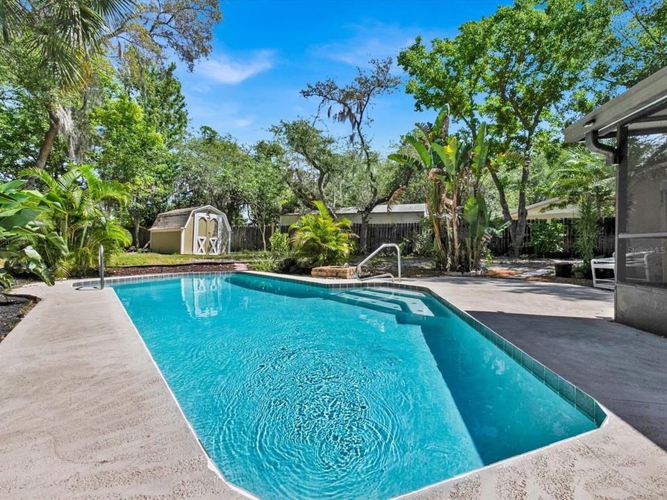 Jump into this inviting pool!  Pool was resurfaced April 2024 with marcite & new tiles (Transferable 10 year warranty to new owner)