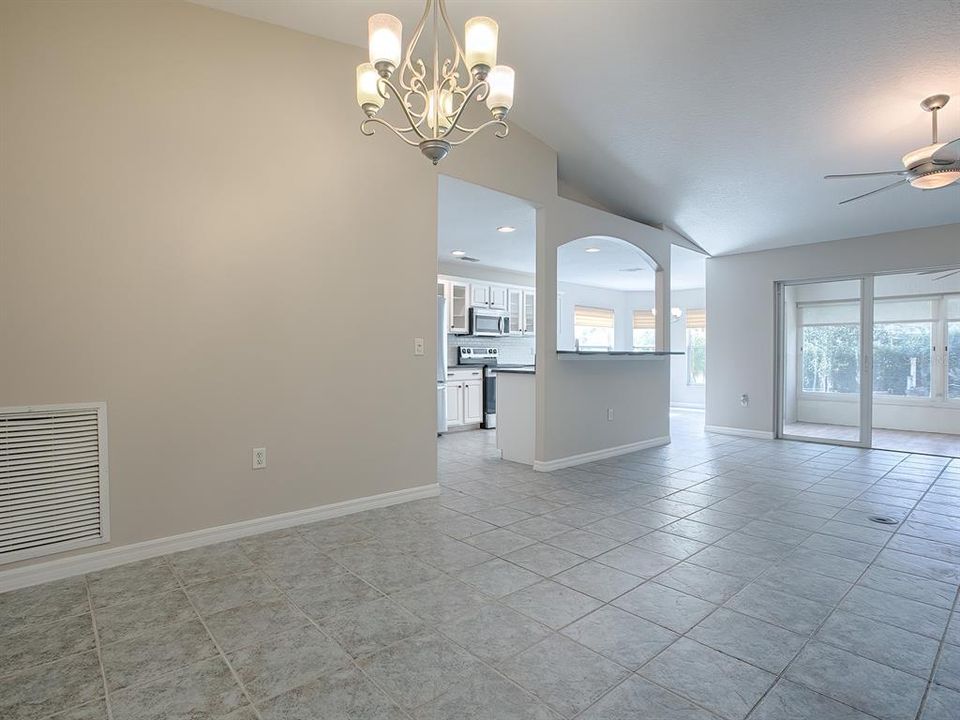 HIGH VAULTED CEILING AND GORGEOUS TILE  FLOORING!