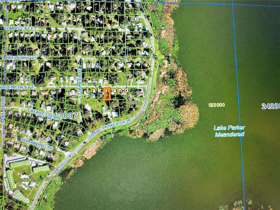 Build your dream home only one block from beautiful Lake Parker!