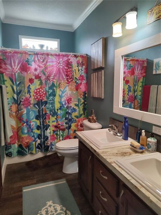 Guest Bathroom with Dual Sink Vanity.