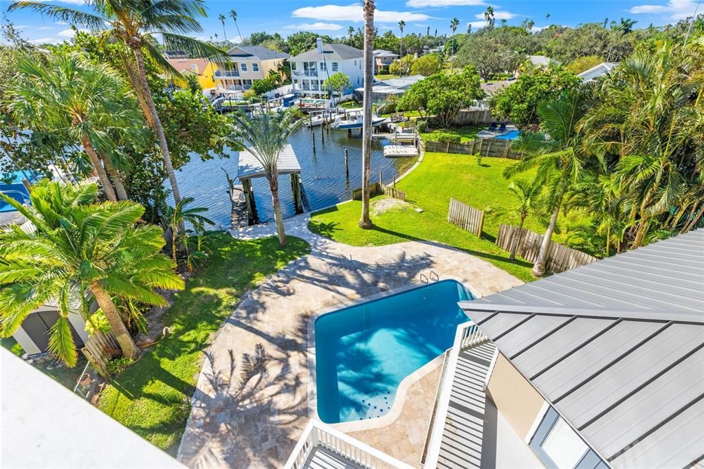 Backyard Oasis with waterfront dock perfect for slipping in kayaks or paddleboards