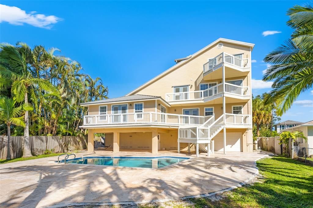 Backyard Oasis with waterfront dock perfect for slipping in kayaks or paddleboards