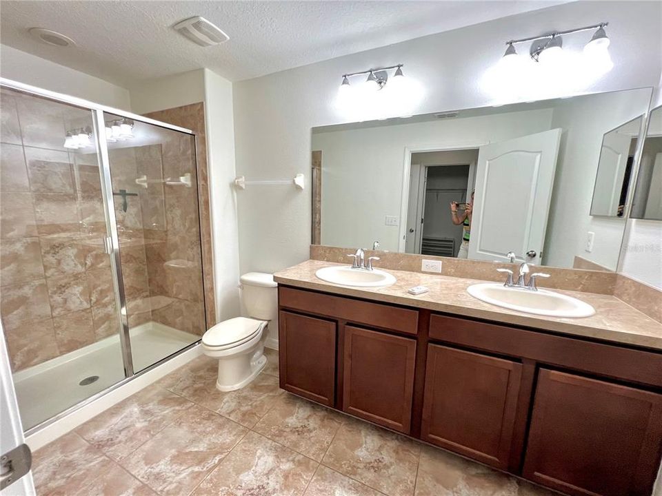 Master en suite with double sink, glass encased tiled shower