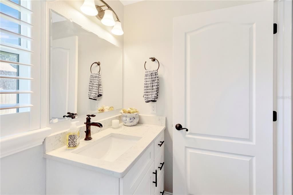 Guest bathroom with plantation shutters!