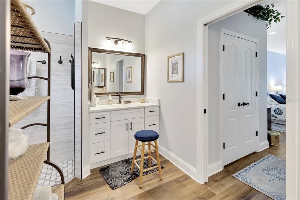 Sinks are separated on each side of the bathroom with 2 separate walk-in closets!