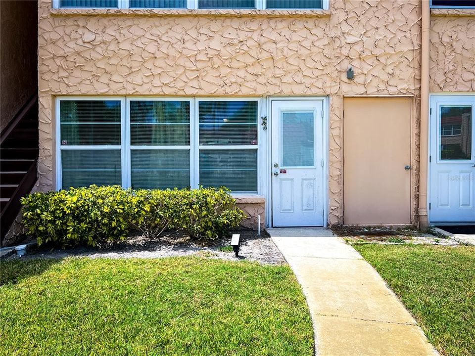 Rear Door sidewalk to pool & Clubhouse