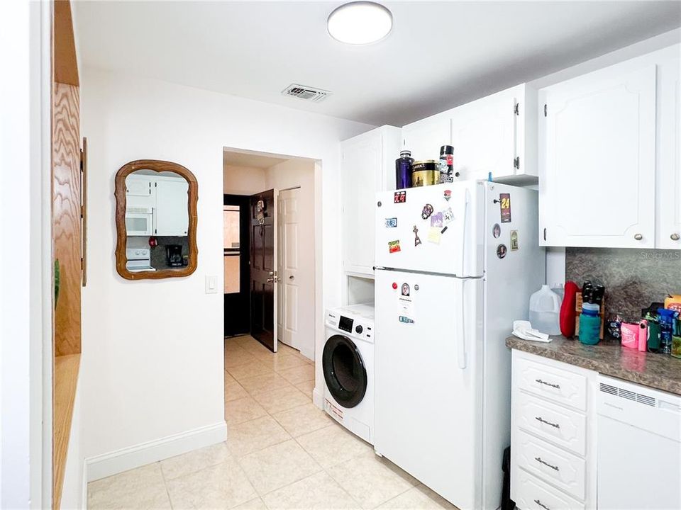 Washer/Dryer space saver Combo in kitchen Addtional Laundry In Clubhouse