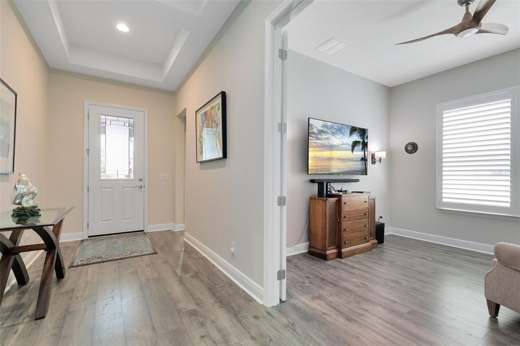 An inviting foyer welcomes you inside this exquisite home.