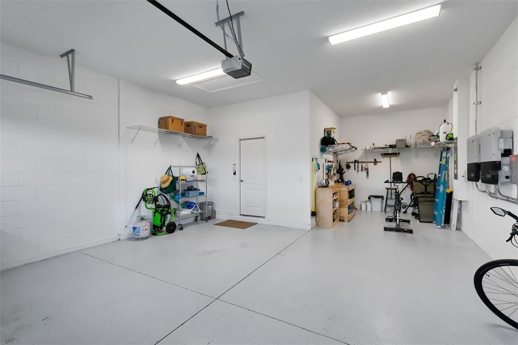 The garage boasts great tandem space, perfect for a golf cart or workshop.