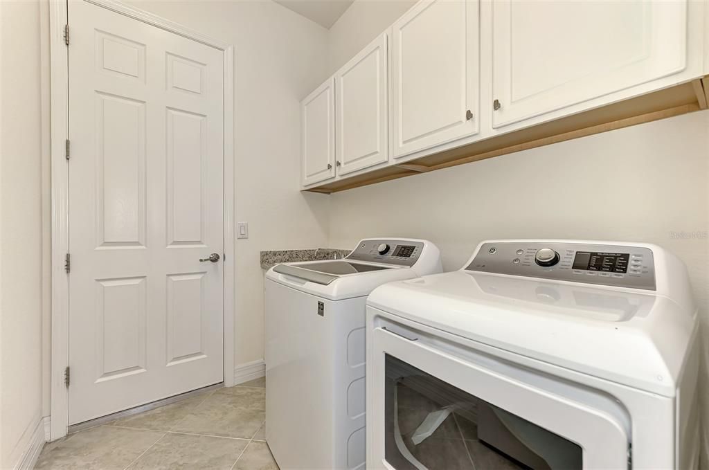 Inside laundry includes washer and dryer