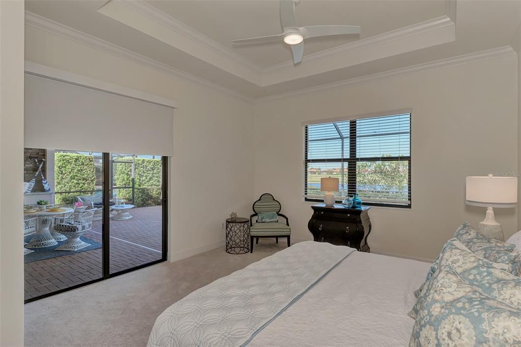 The master bedroom has a walkout to the lanai