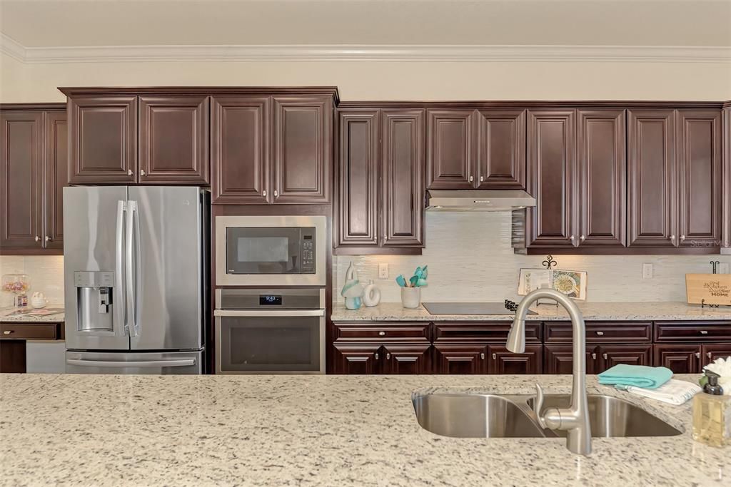 The kitchen in the Angelina has a large counter area for dining and entertaining!