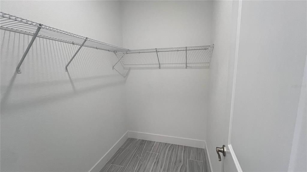Primary - His/Hers Walk-in Closet
