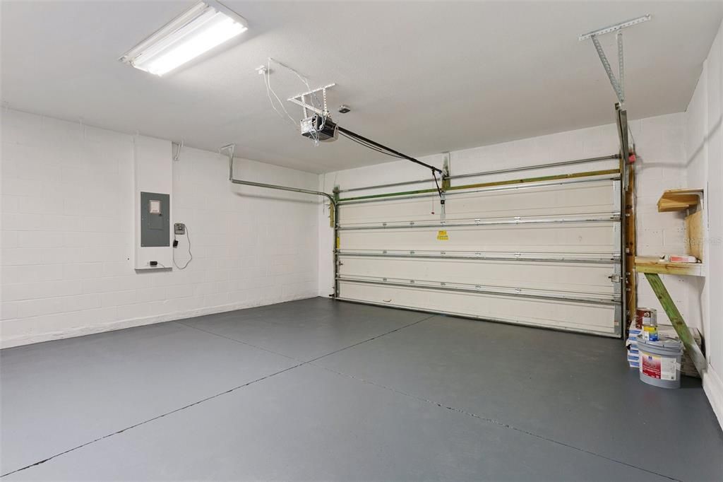 garage with fresh paint on ceiling, walls AND floor