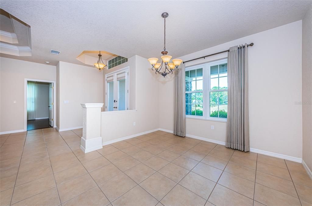 chandelier and ceramic tile. Lots of natural light.