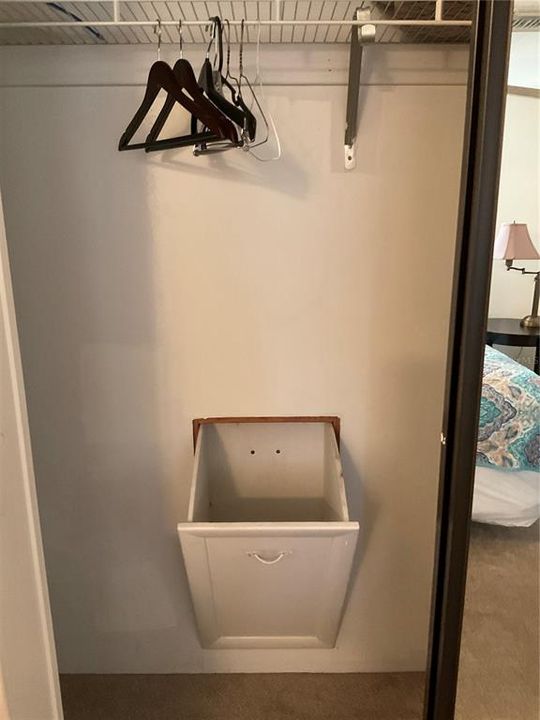 laundry chute in bedroom two to laundry room