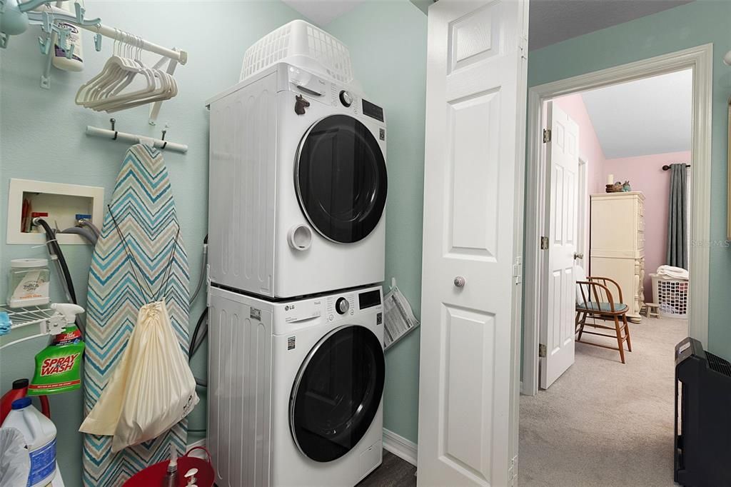 The laundry room conveniently located upstairs