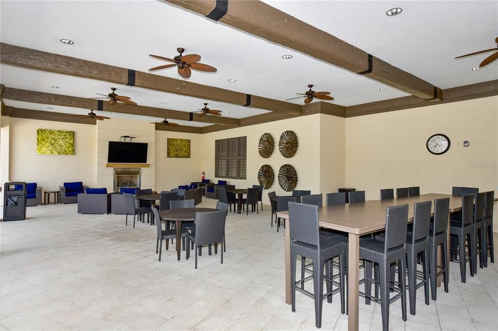 Covered Pavillion Area with Fireplace, Seating and TV! Can be rented for your gatherings
