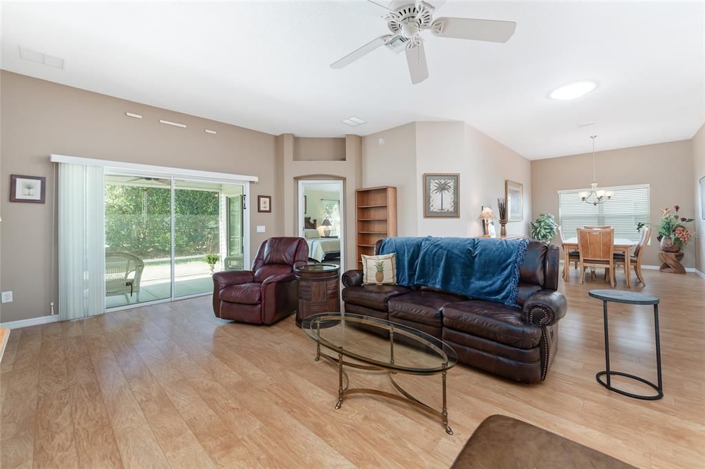 LIVING ROOM OPENS TO LANAI AND SEPARATES PRIMARY SUITE FROM GUEST WING