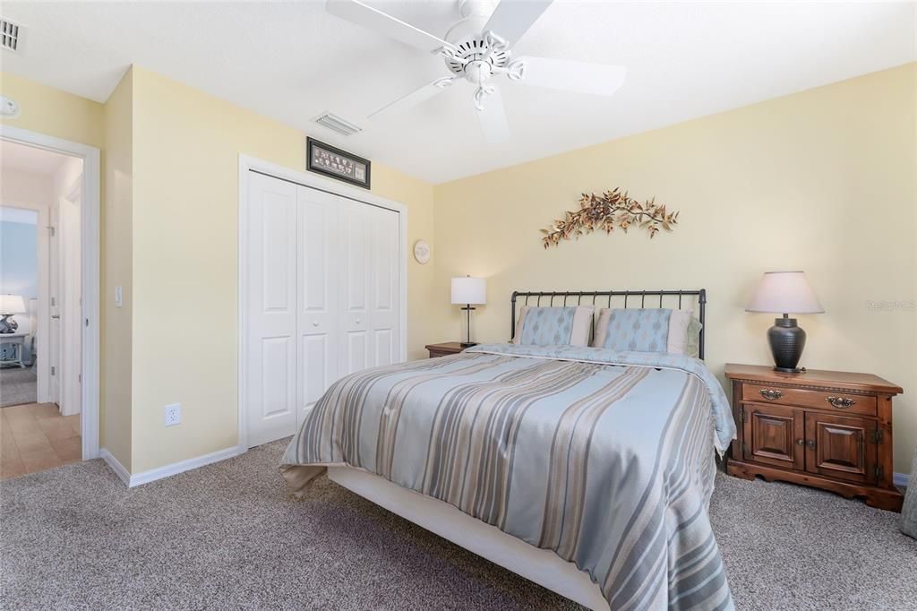 GUEST ROOM HAS AMPLE CLOSET SPACE AND CEILING FAN
