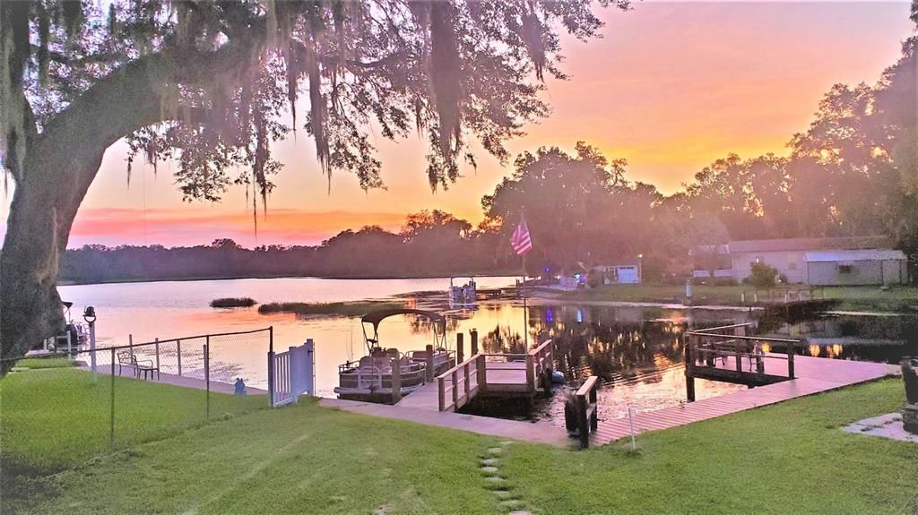 SUNSETTING OVER BACKYARD LAKE