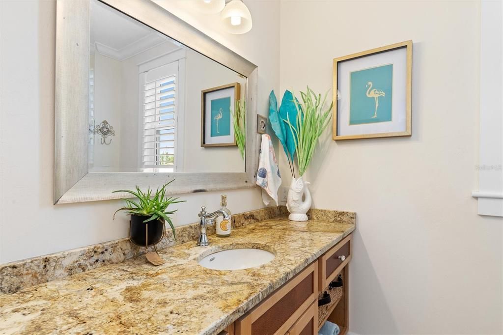 Spacious guest bathroom with tub and shower combination