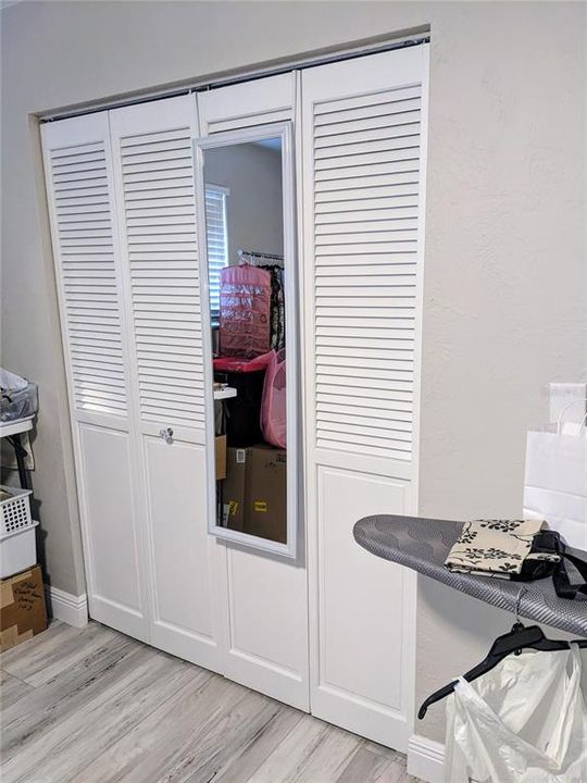 ... and about another 10' of closet space on the other side. Two windows in this guest room which is currently used as a dressing area.