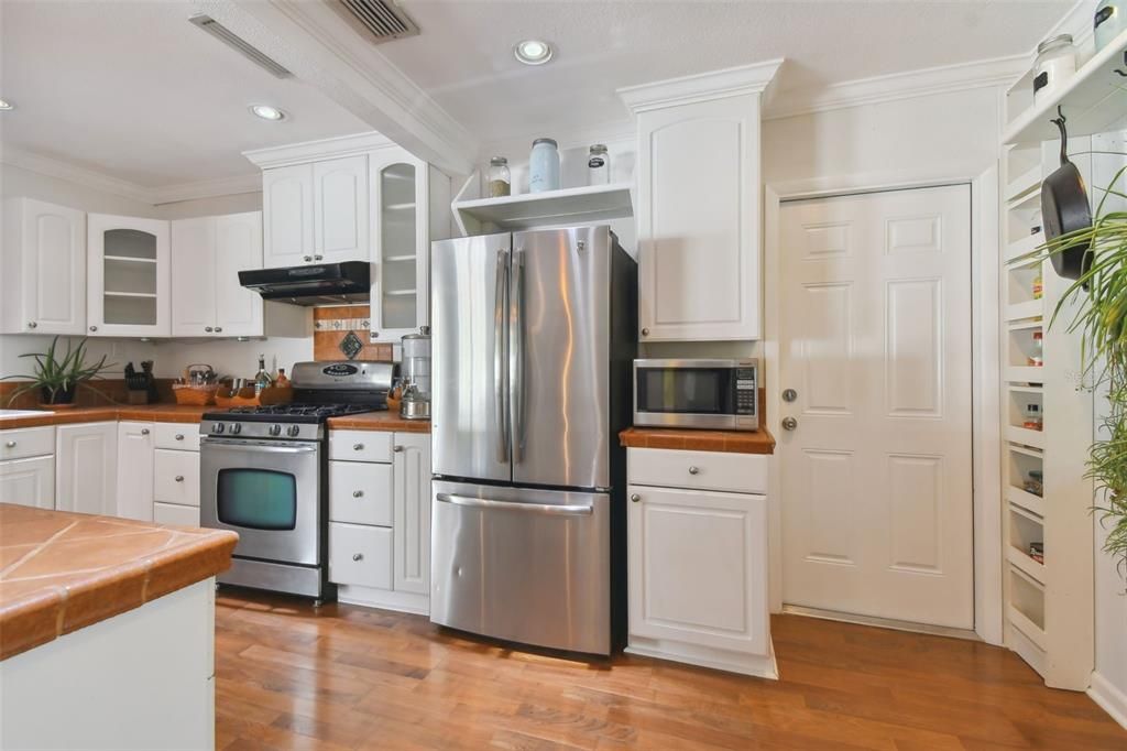 Very nice kitchen with tiled counter tops