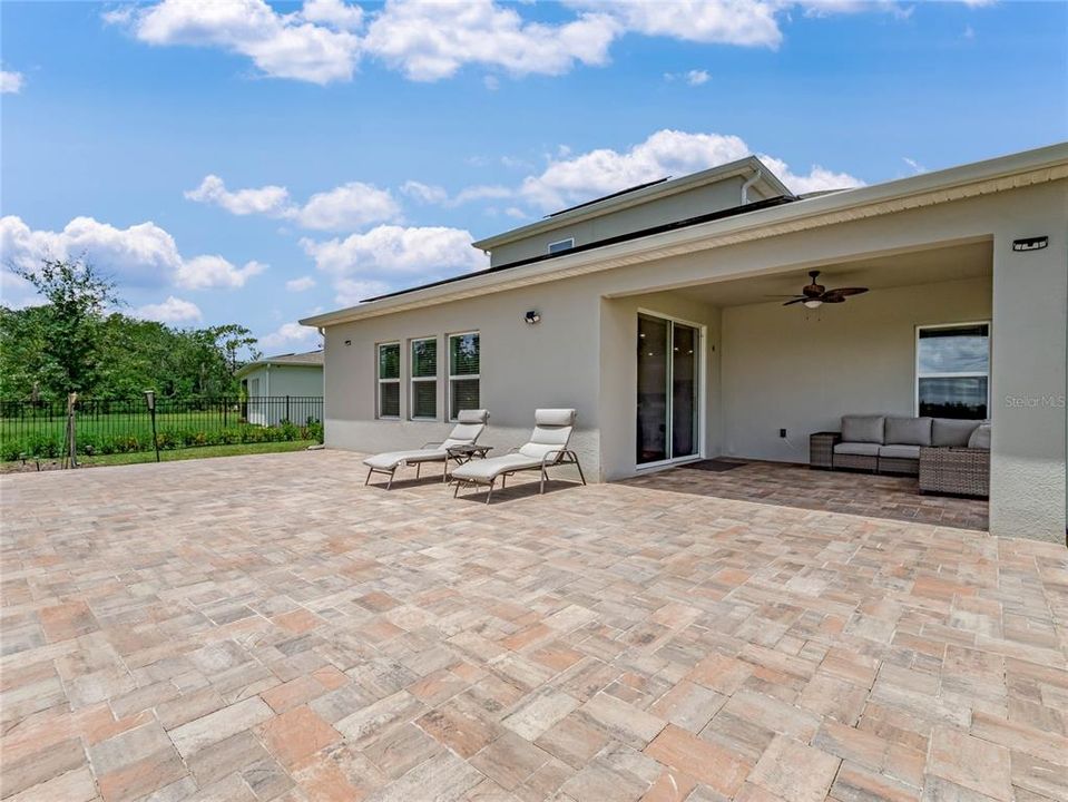 Expansive Paver Patio overlooking the Water