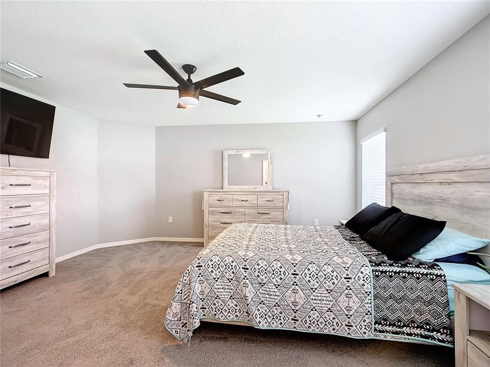 Spacious Primary Bedroom located in back of home.