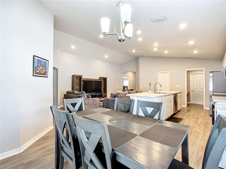 Dining/Kitchen/Living room combo makes this space perfect for entertaining your family and friends.