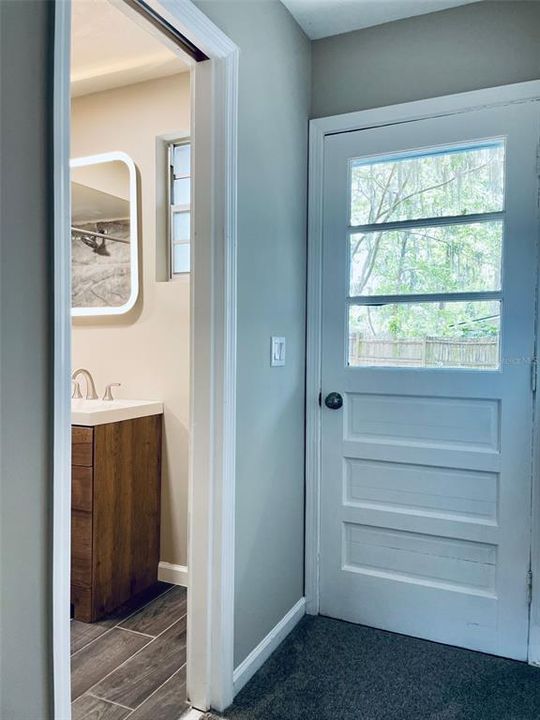 MASTER BATHROOM AND DOOR TO OUTSIDE