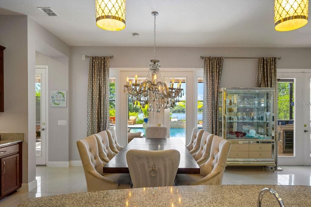 Second Dining Room Table with lake and pool views