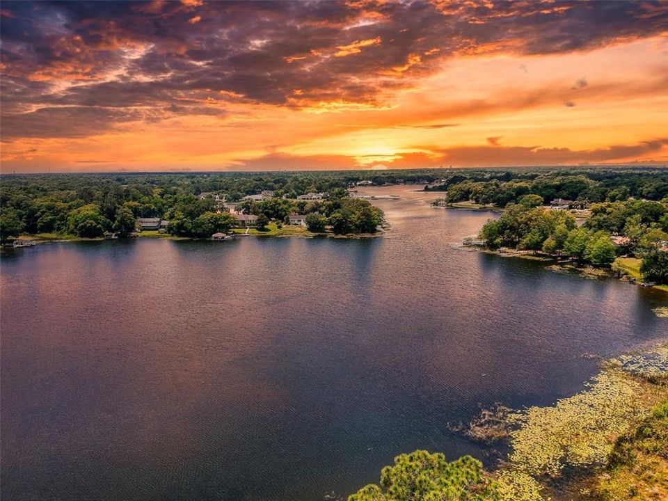 sunset over the lake in front of home