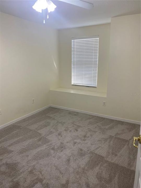 Upstairs spare bedroom reading seat area