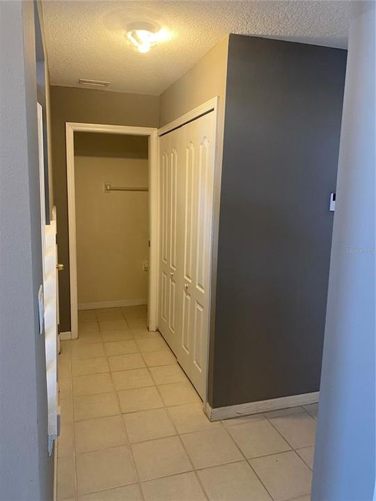 Hall way to guest bath and laundry room