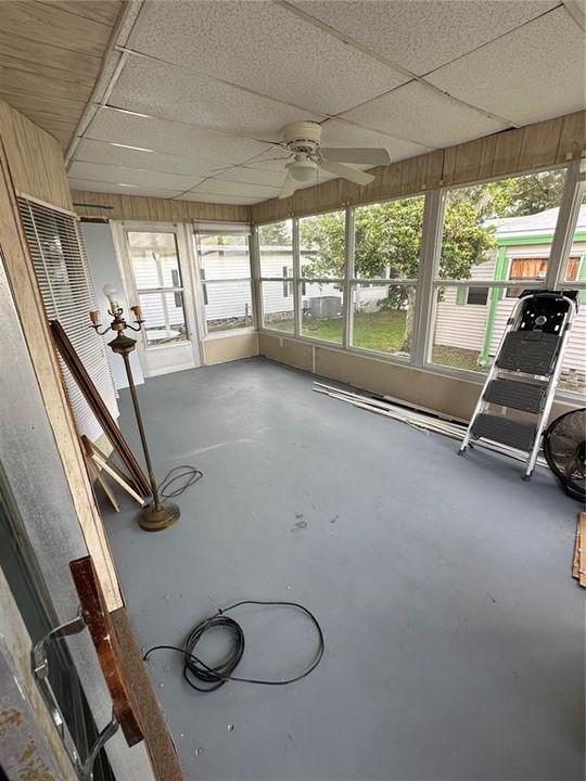 Enclosed screen porch.