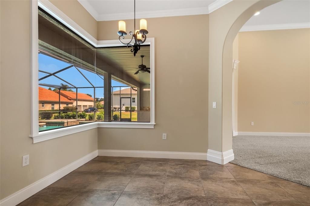 Eat-in area in kitchen, over looking the pool.