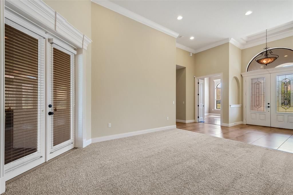 From the formal living area, a view into the designated office