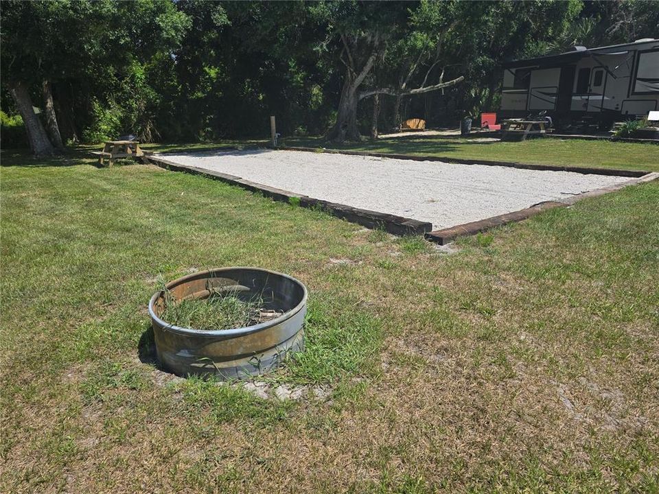 Full service RV Air BNB pad with fire pit and picnic table