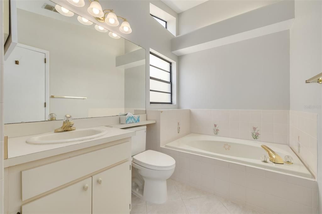 Primary bath with soaking tub and separate shower stall