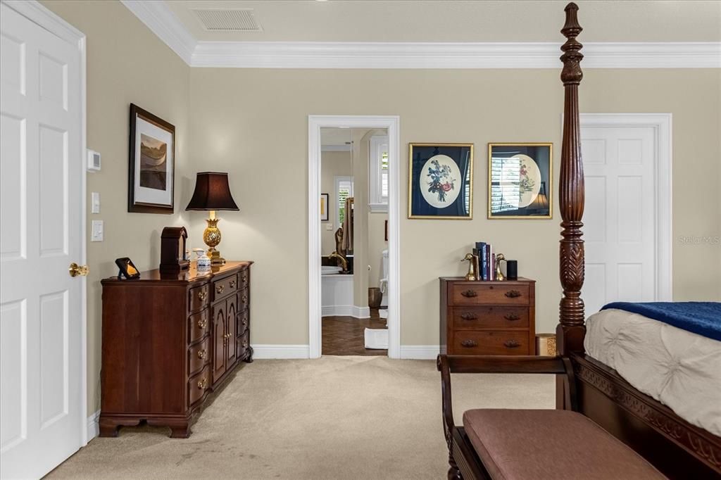 Looking towards primary ensuite bathroom and walk-in closet