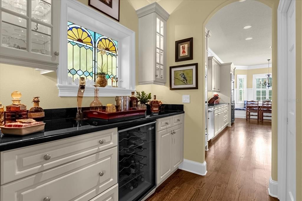 Butler's pantry, dining room behind photographer