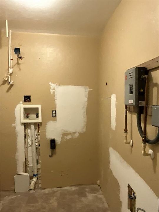 Home 1 Laundry room & Tankless hot water tank