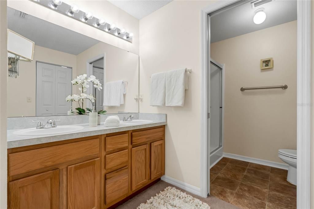 Master bathroom features a water closet
