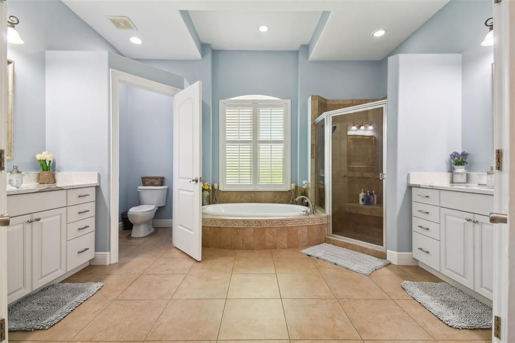 Owners suite attached bath with jacuzzi tub, separate shower, dual sinks & Water closet